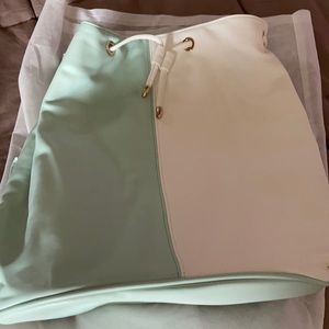 Backpack bag from Neiman Marcus brand. Two tones.